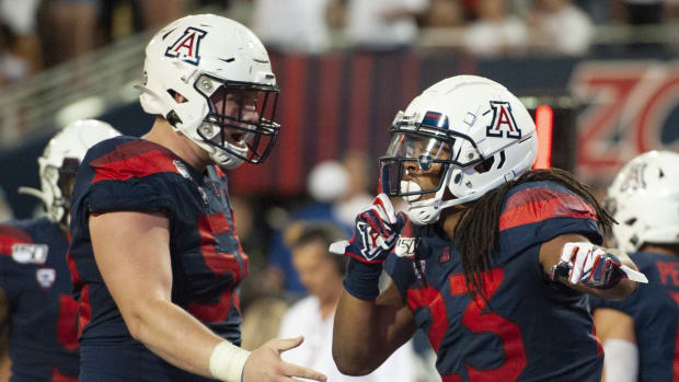 Arizona Wildcats running back Gary Brightwell (23) celebrates a touchdown against the Texas Tech Red Raiders.