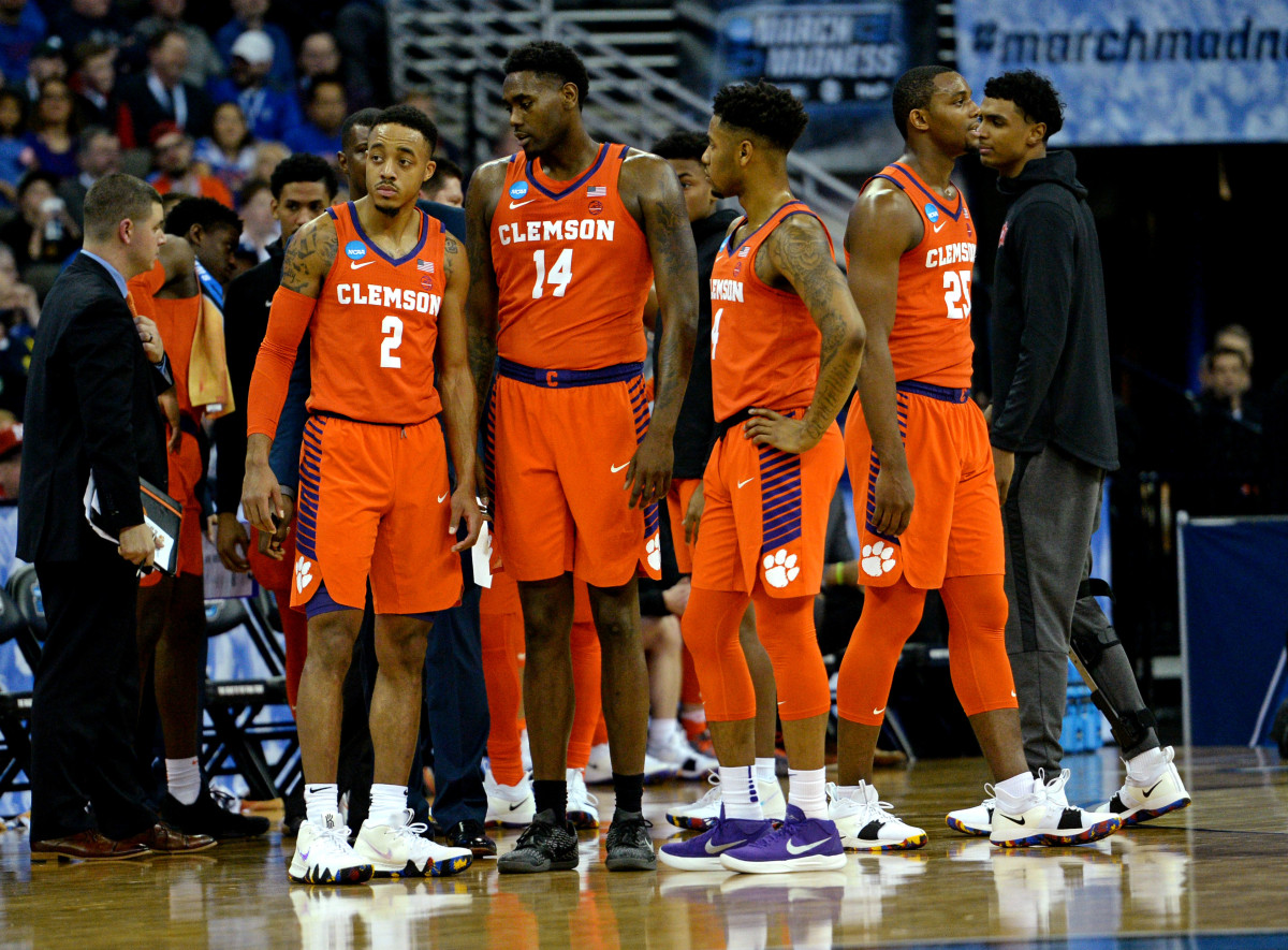 Marcquise Reed (2), forward Elijah Thomas (14) and guard Shelton Mitchell (4) all made major impacts after transferring to Clemson.